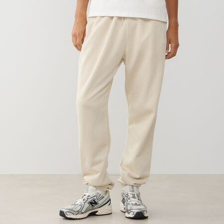 NEW BALANCE PANT JOGGER SMALL LOGO FT BEIGE/BLANC HEREN