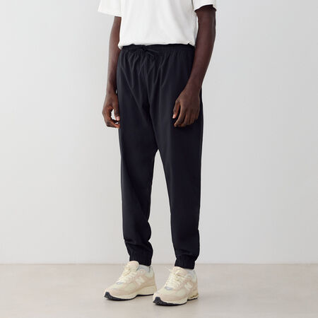 NEW BALANCE PANT JOGGER WOVEN NOIR/BLANC HOMME