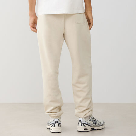 NEW BALANCE PANT JOGGER SMALL LOGO FT BEIGE/BLANC HEREN